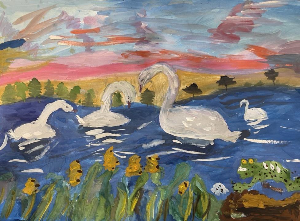 Лебеди на пруду